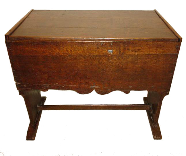 English early sixteenth century oak planked decorated counter table